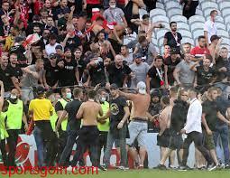 French football wrestles with violence in stadiums as fans return
