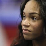 Knee injury ends Jones's Olympic gymnastics bid