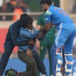A Fan Rushes Onto the Field Immediately After Kohli’s Century
