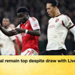 Arsenal remain top despite draw with Liverpool Arsenal remain top despite draw with Liverpool